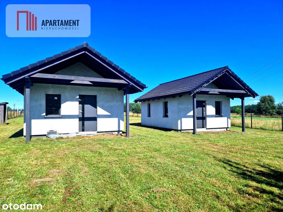 Budynek mieszkalny z domkami rekreacyjnymi.-16