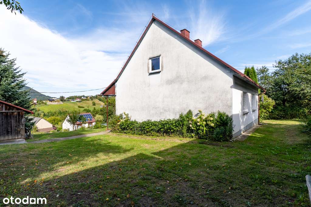 Dom z potencjałem w otoczeniu natury-8