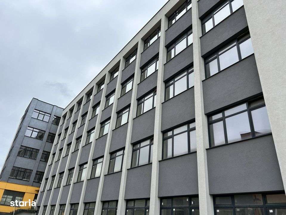 Cladire de vanzare D+P+4 cu 4670mp utili si curte 3650mp la 1280euro/m - Imagine principală: 1/16