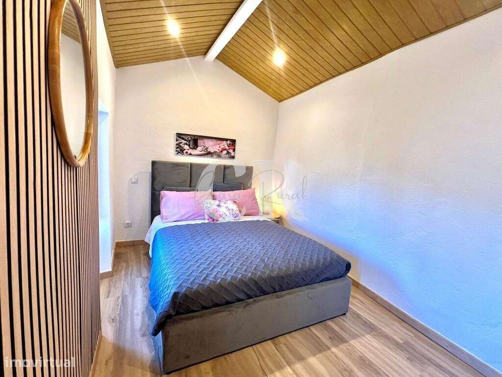 Moradia acolhedora no centro histórico com potencial de investimento-14