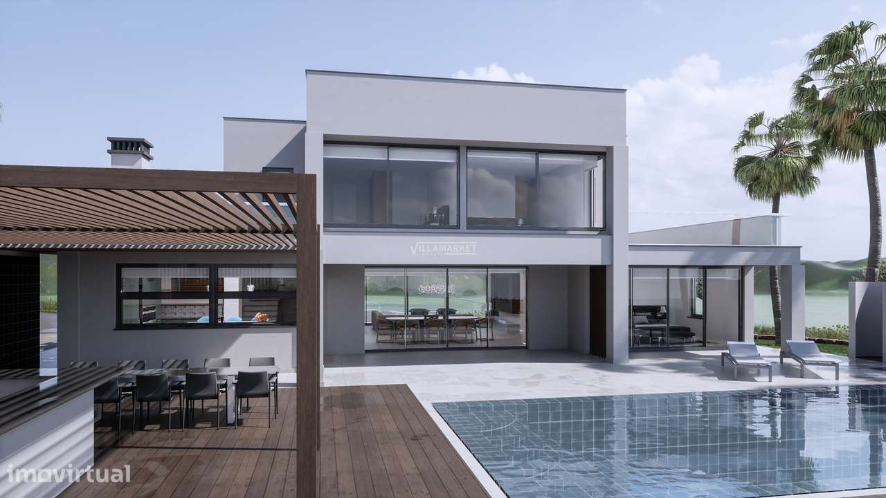 LUXUOSA VILLA V4  DE ARQUITETURA MODERNA COM PISCINA SITUADA NA ZONA D-8