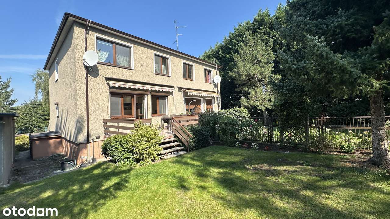 Pół bliźniaka 108 m kw z tarasem, pięknym ogrodem, piwnicą i garażem.-2