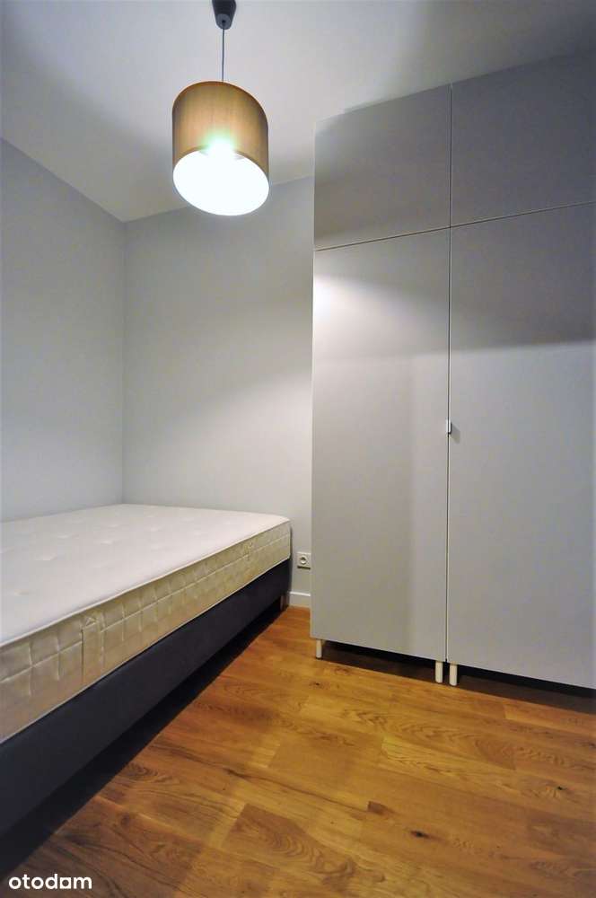 Kawalerka z sypialnią, balkonem i garażem.-6