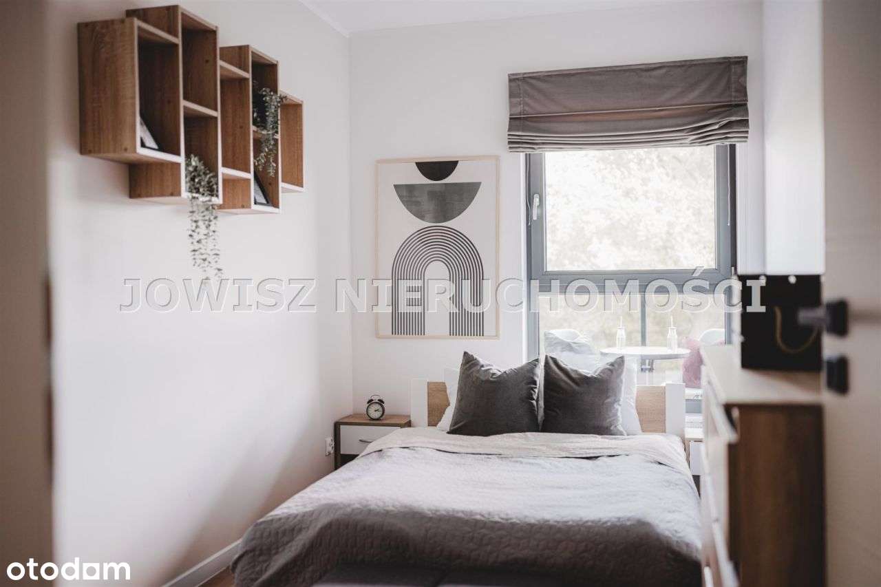 53,53 m2 ul 4 Pory Roku,z miejscem postojowym-7