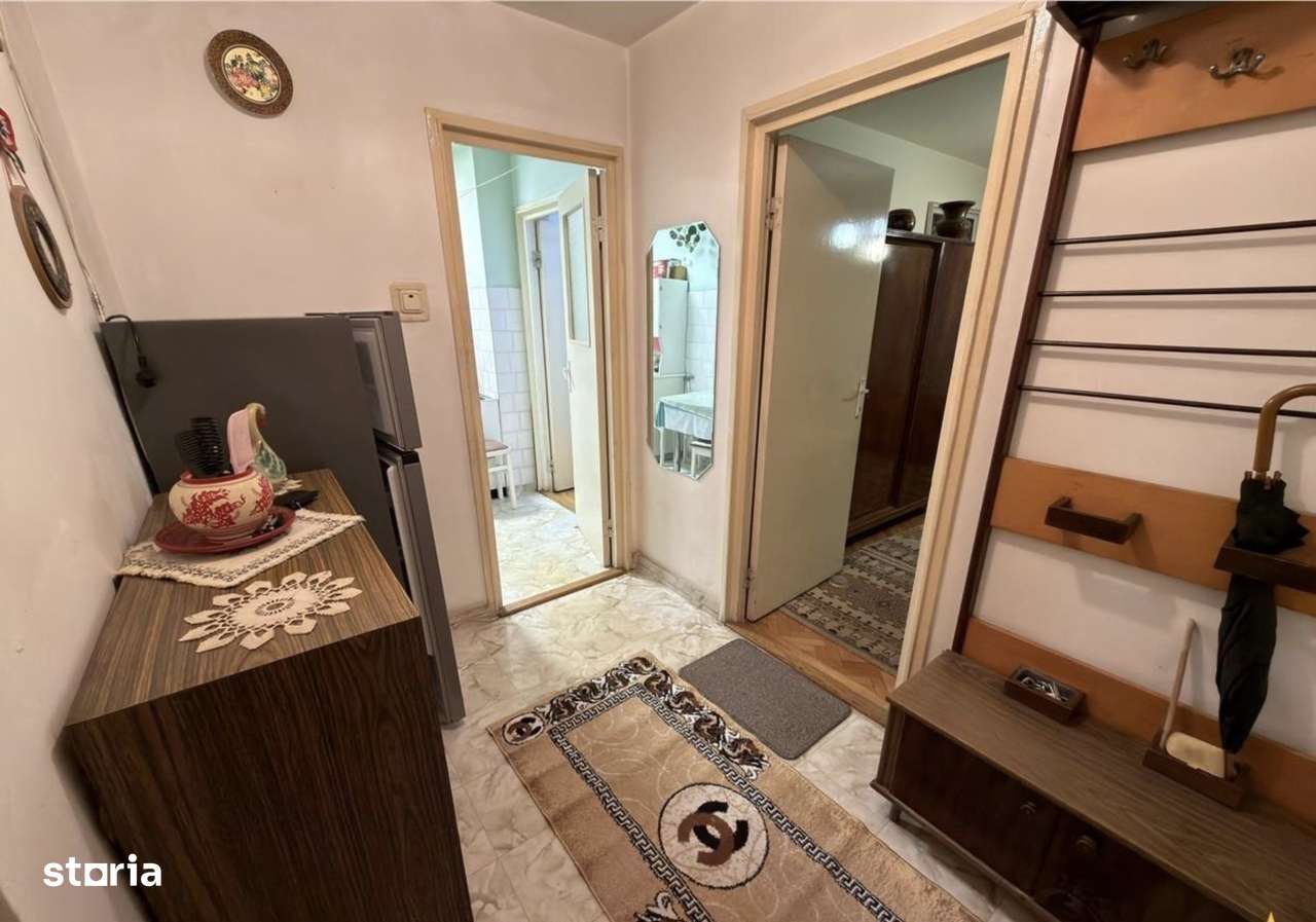 Apartament luminos cu 2 camere, zona Dambu-0