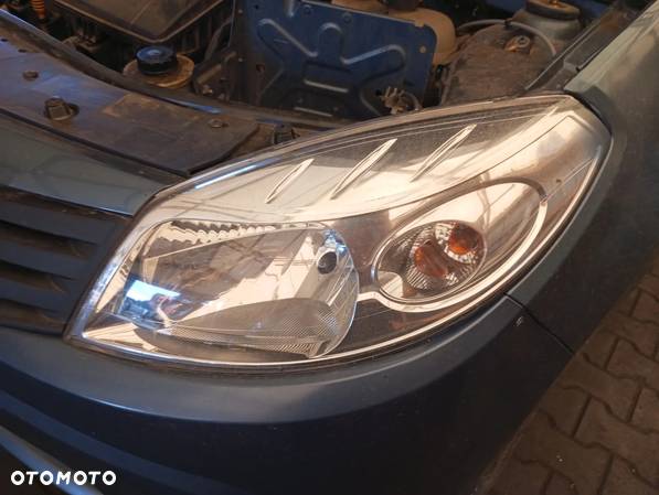 LAMPA LEWA PRZÓD DACIA SANDERO 2010R - 1