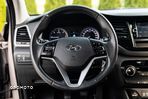 Hyundai Tucson blue 1.7 CRDi 2WD Intro Edition - 31