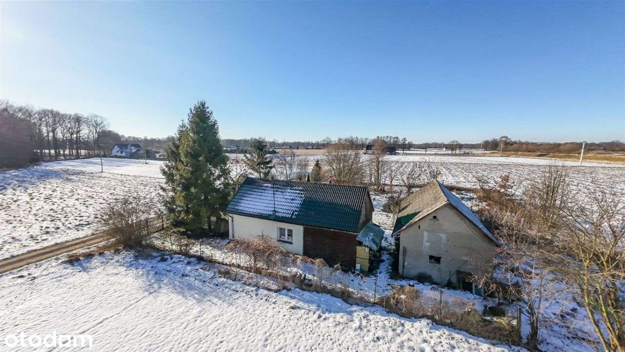 Dom z dużą działką w spokojnej okolicy-5