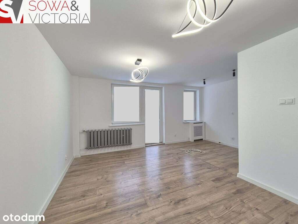 Trzypokojowe mieszkanie z dużym balkonem.-2