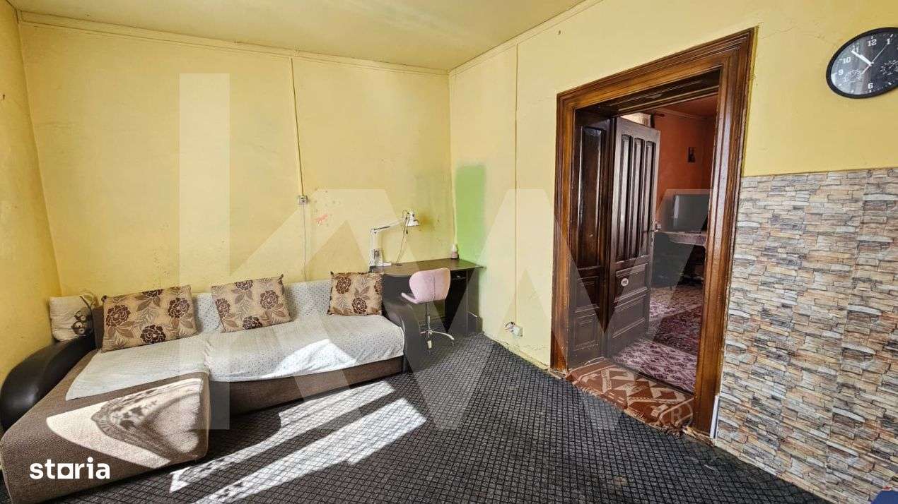 Casa individuala compusa din doua apartamente, cu teren liber de 540 m - Imagine principală: 5/19