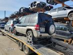 usa portiera stanga dreapta motoras macara geam maner broasca Dezmembrez Mitsubishi Pajero Pinin motor 1.8 benzina dezmembrez - 1