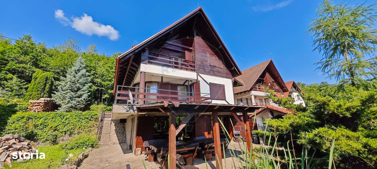 Vilă cu 6 camere, teren de 1000mp, într-un resort montan privat - Imagine principală: 2/20