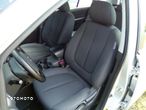 Kia Carens 2.0 CRDi Tour - 12