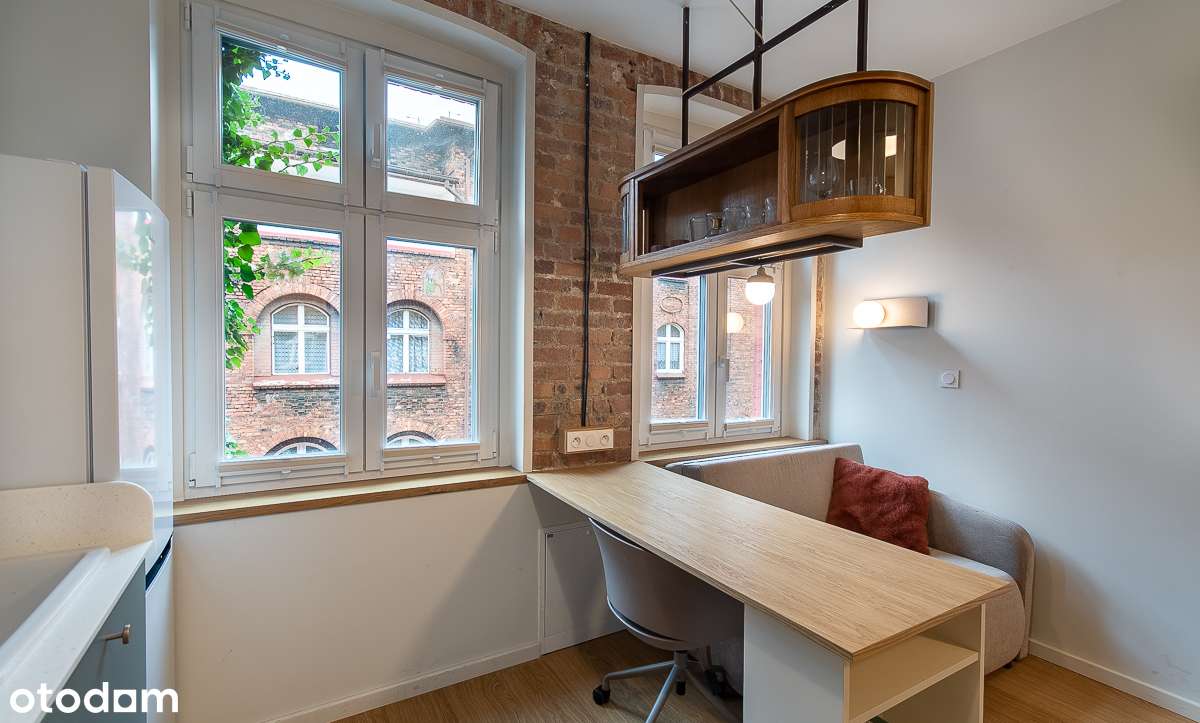 Nietuzinkowa kawalerka na zabytkowym Nikiszowcu-7