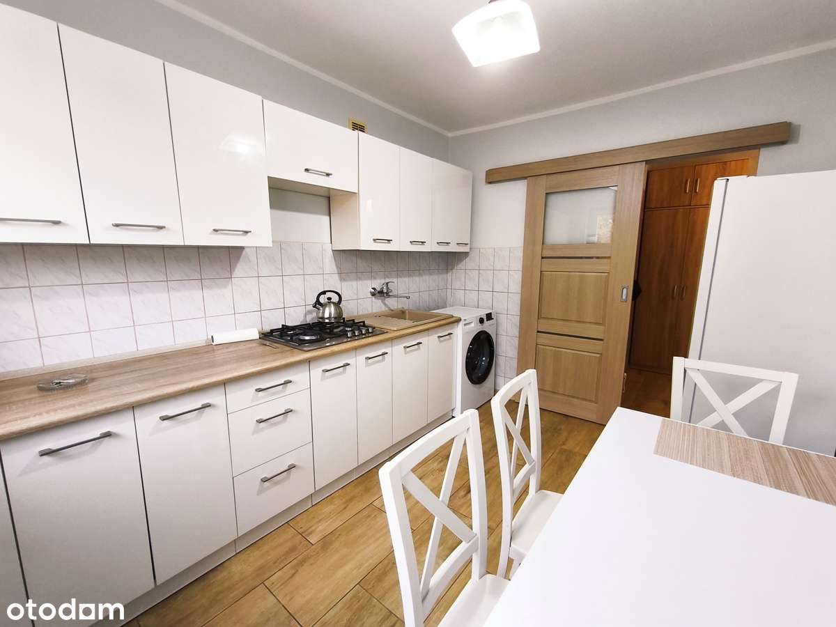 Przestronna kawalerka, II piętro, po remoncie, w niskim bloku z cegły-1