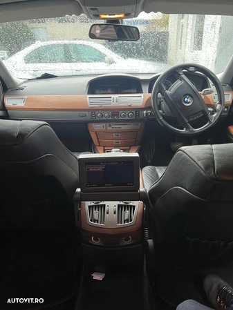 Dezmembrez BMW seria 7 E66 730Ld M57 231cp cutie calculator usa aripa capota portbagaj trager bara faruri xenon stop interior jante navigatie oglinzi plafon praguri volan etc - 14