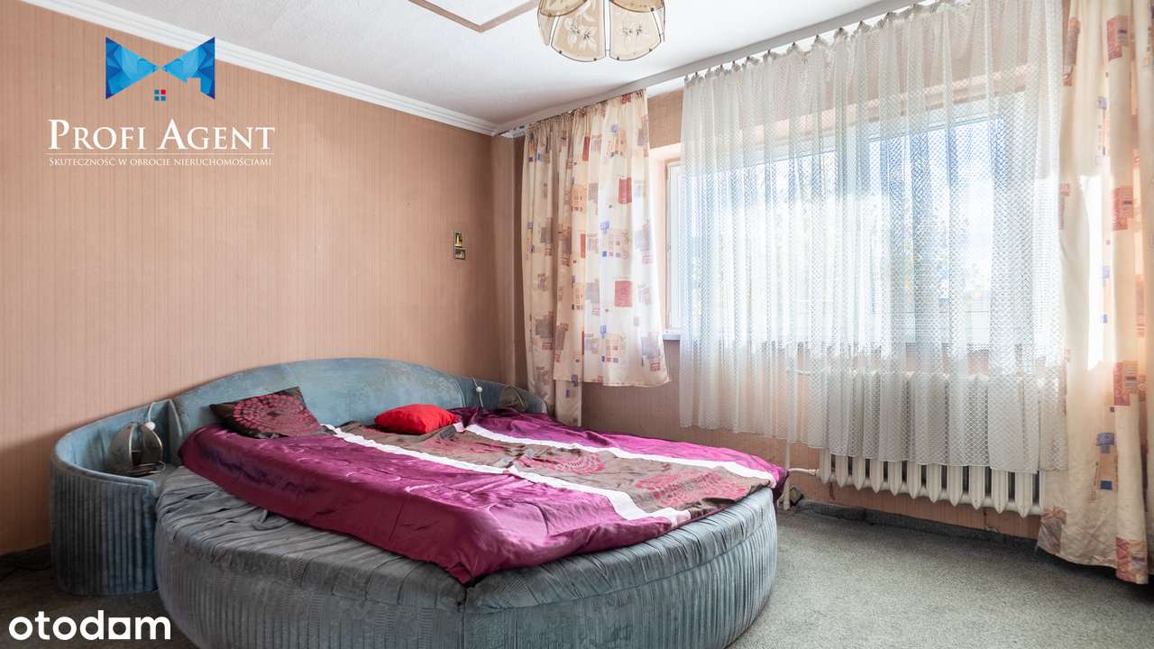 Przestrzeń do życia i oddechu – dom z garażem i zieloną działką-19