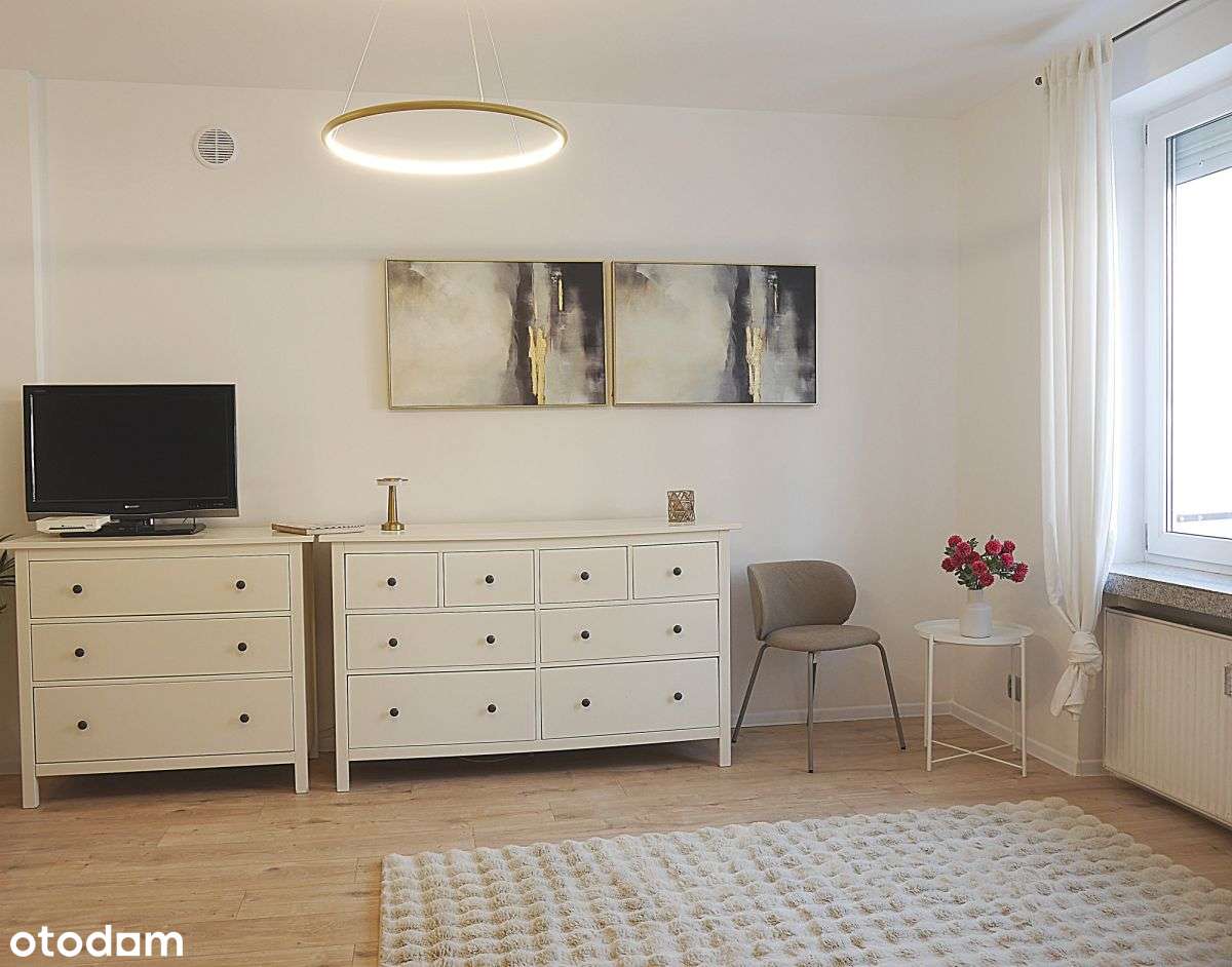 Atrakcyjna przestronna kawalerka-1