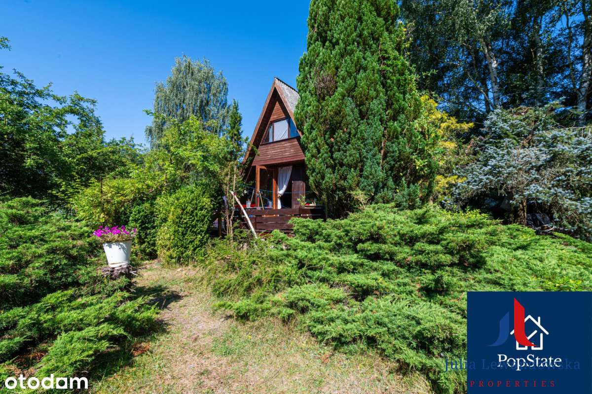 Działka budowlana z domkiem letniskowym-0