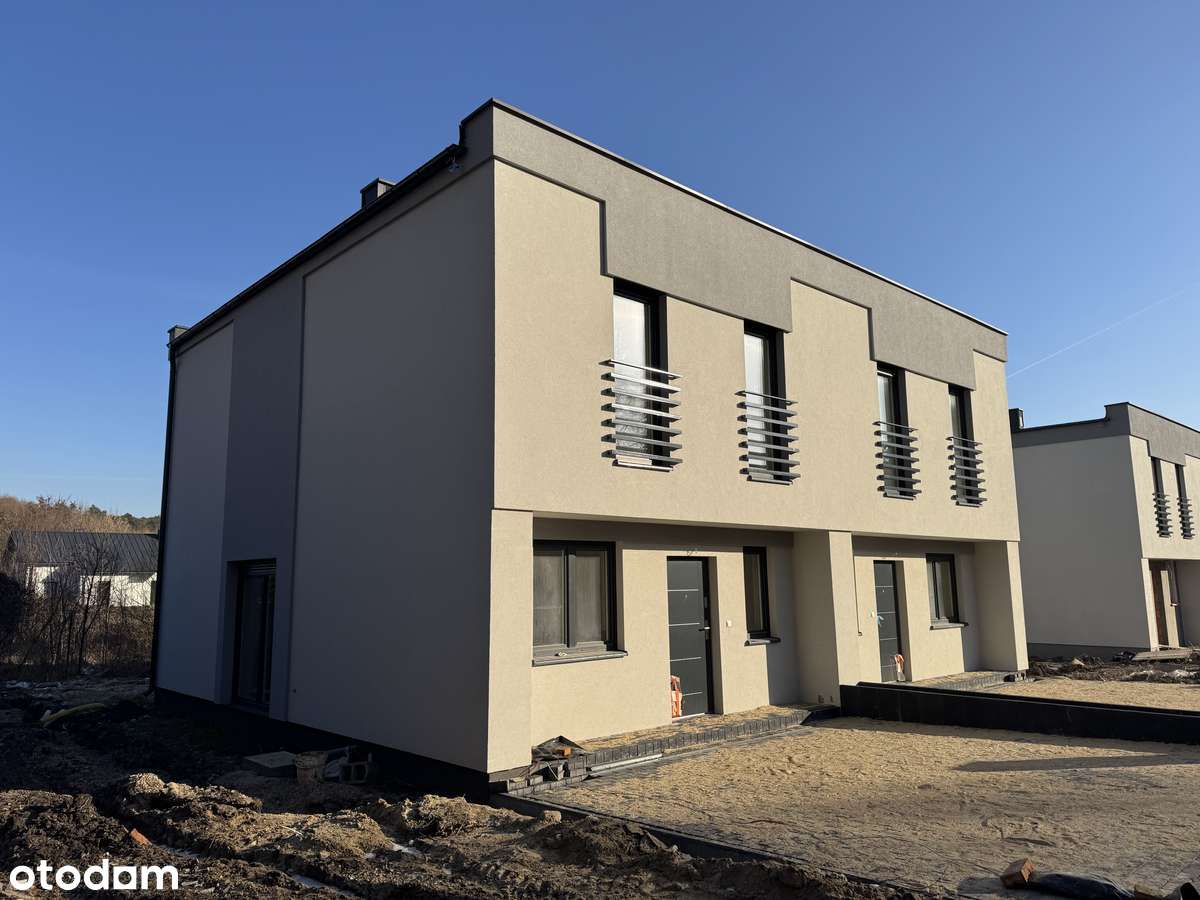 Energooszczędny bliźniak z dużym salonem.-3