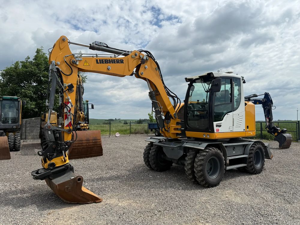 Liebherr 910 rototilt + szczypce 2015