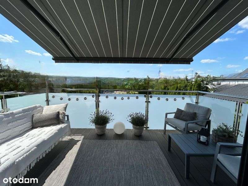 Dwupoziomowy apartament z dużym tarasem i miejscem postojowym.-0