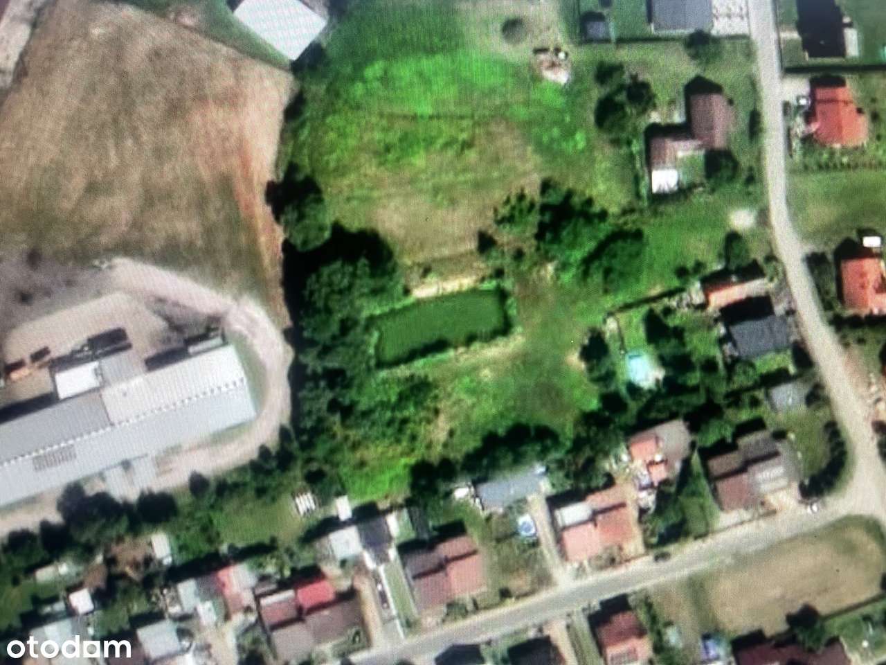 Działka budowlana ze stawem , z przeznaczeniem MU - Pełny obrazek: 1/4