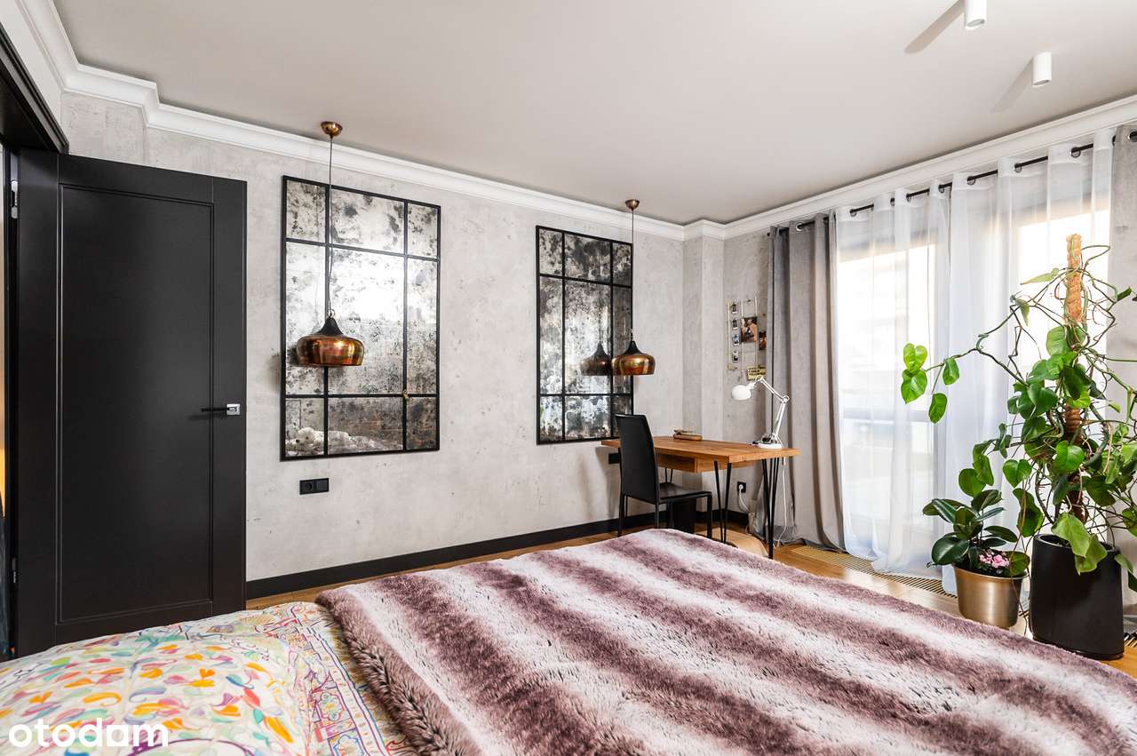 Apartament, który nie próbuje się podobać. On po prostu robi wrażenie.-17