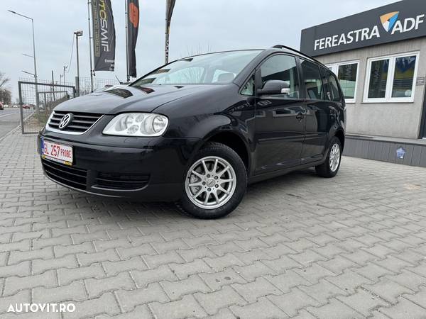 Volkswagen Touran 2.0TDI Highline Aut - 1