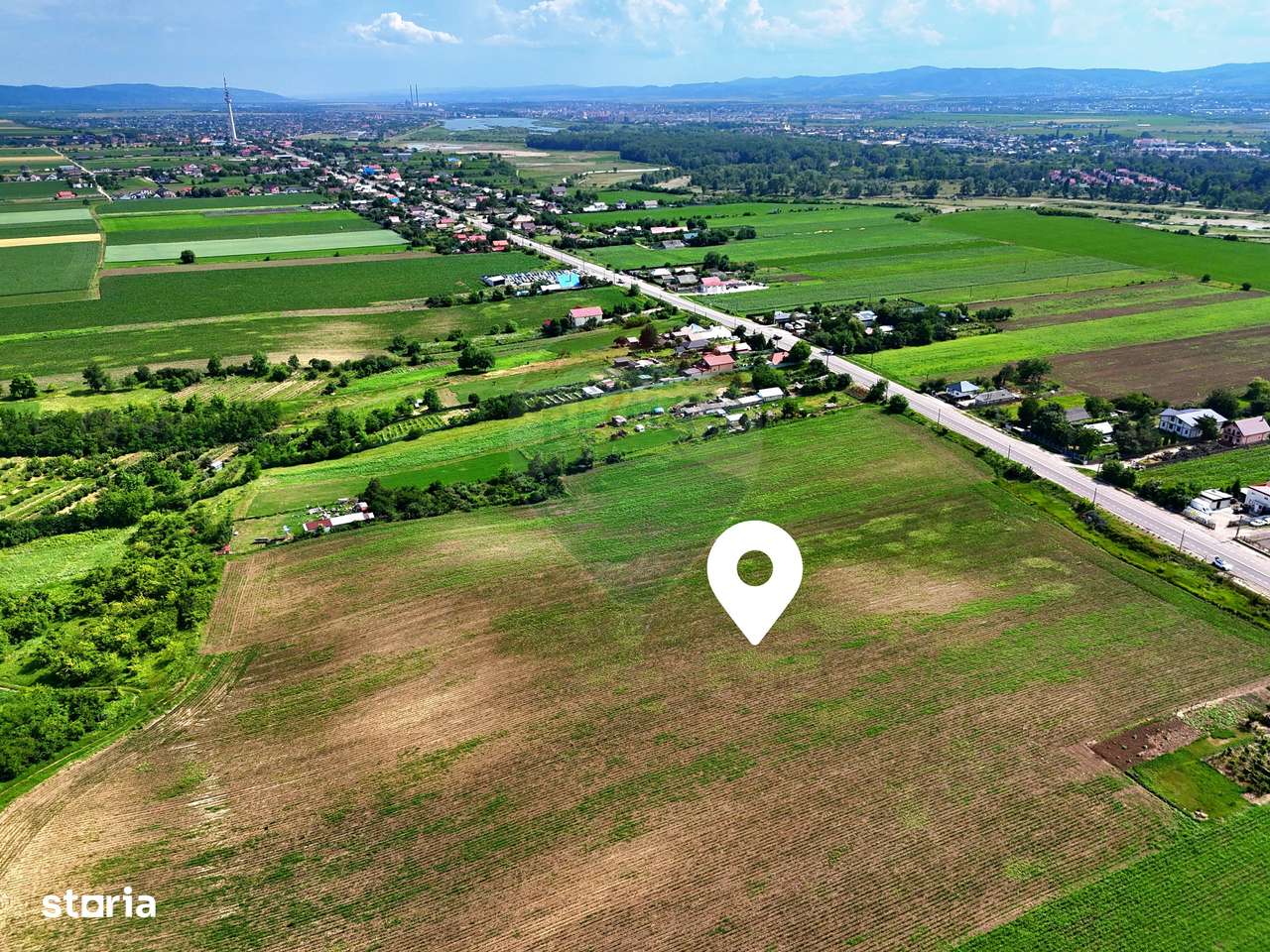 Teren de vânzare în Bogdan Vodă, Bacău – 7.502 mp cu deschidere la E85 - Imagine principală: 4/5