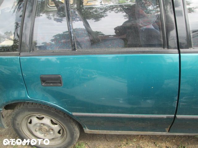 DRZWI PRAWE TYLNE SUZUKI SWIFT 96-04 - 1