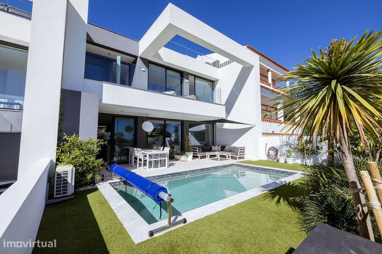 MODERNA E LUXUOSA MORADIA T3 COM PISCINA E GARAGEM PERTO DA MARINA DE-15