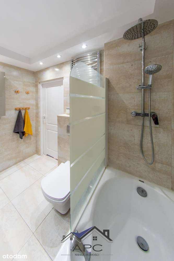 Mieszkanie z ogródkiem, garażem i klimatem!-10