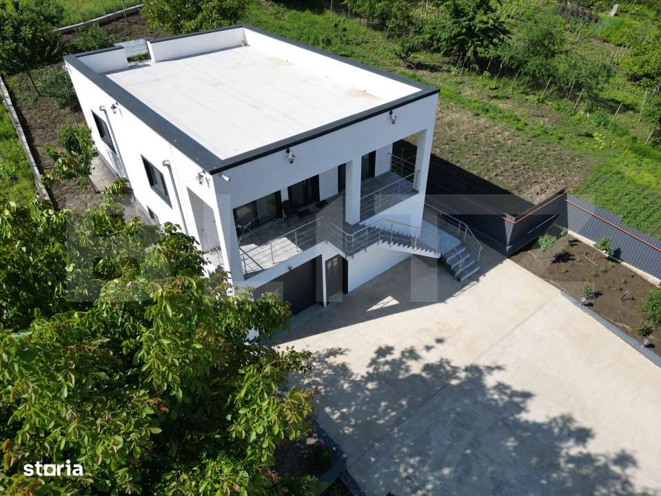 Casa 4 camere, 200 mp, 1050 mp teren, zona Ciurbesti - Imagine principală: 3/19