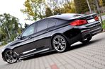 BMW Seria 5 M550i xDrive sport - 9