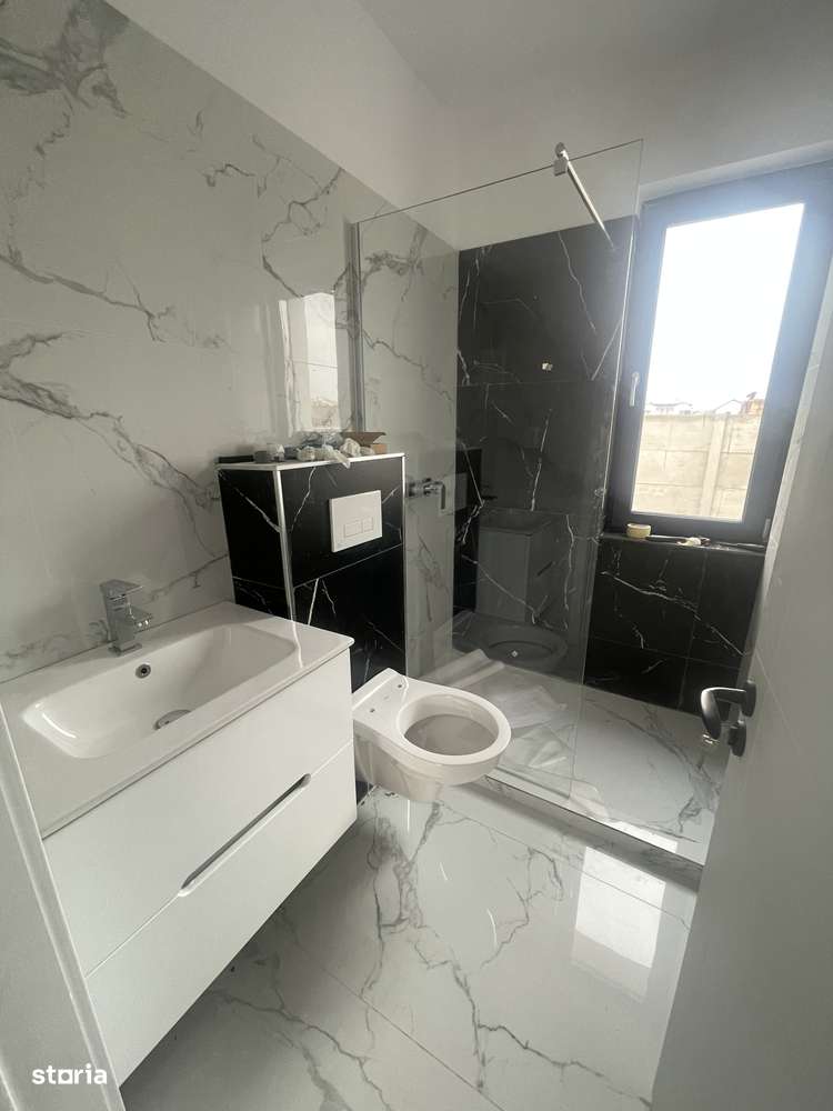 Casă modernă cu mansardă și curte, ideală pentru familie-1