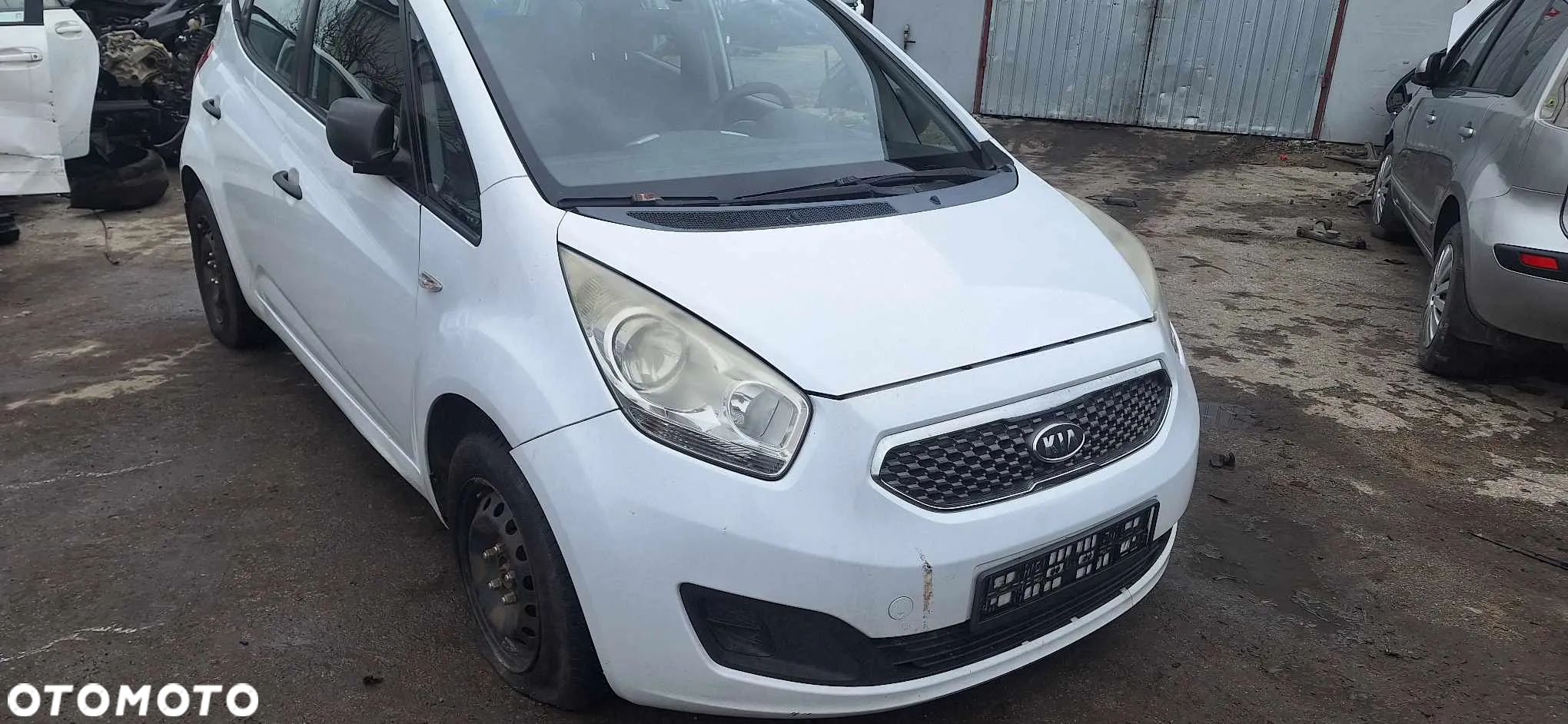 KIA VENGA 1,4CRDI mcperson lewy przód - 1