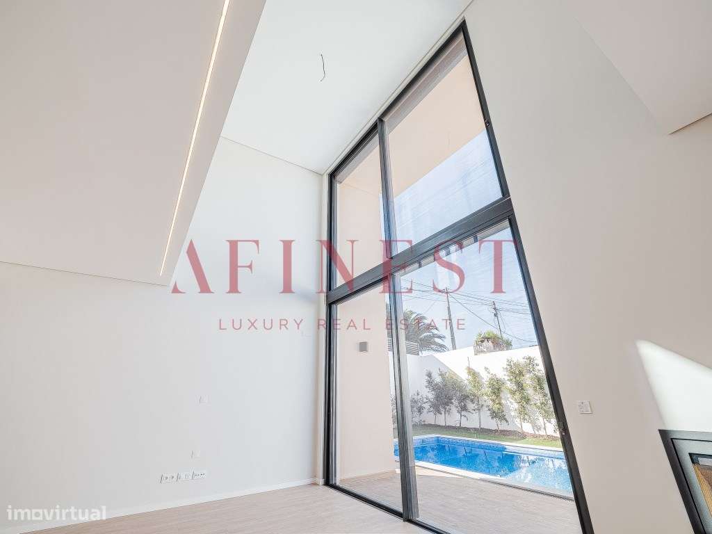 Moradia T4 de Luxo com Rooftop e Vistas Panorâmicas em Cascais - Grande imagem: 5/52