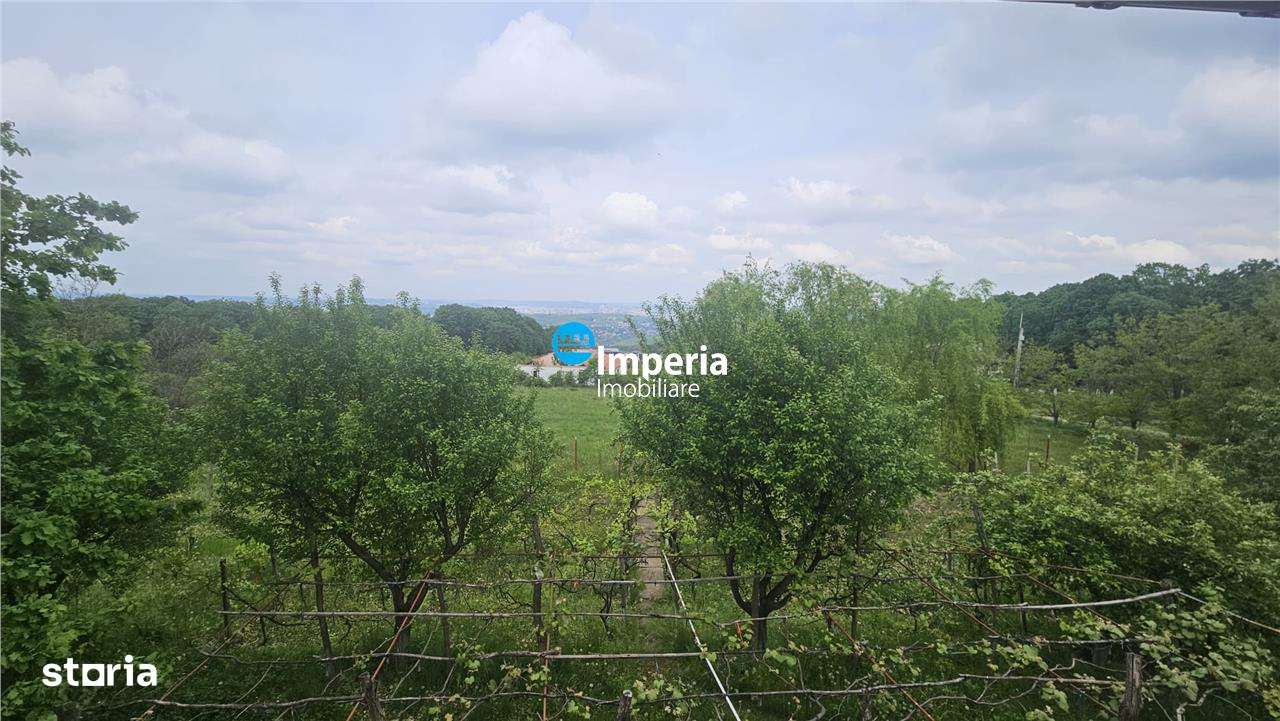 Casa deosebita in mijlocul naturii, cu teren generos si priveliste pan - Imagine principală: 3/5