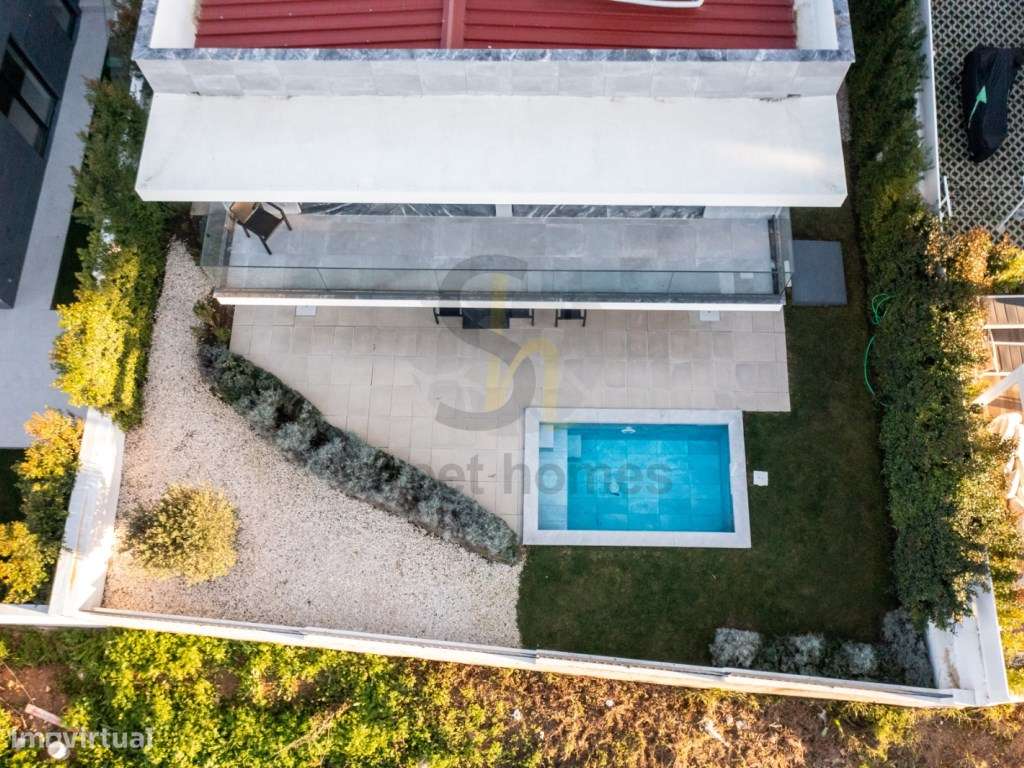 Exclusividade e Design: Moradia Contemporânea com Piscina no Coraçã...-4
