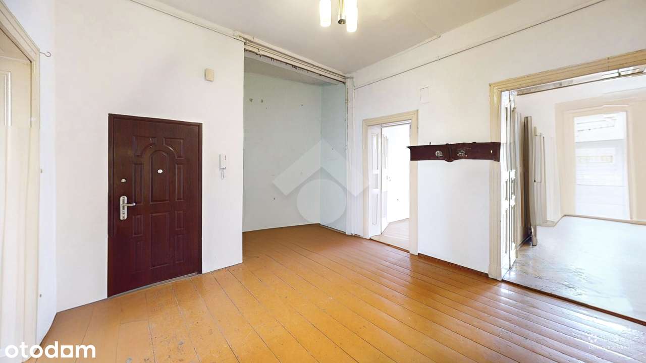 Dwustronne wysokie mieszkanie z oryginalnymi detalami-6