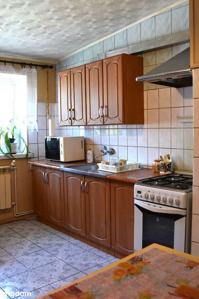 Mieszkanie 2 pokoje 1p., 2 garażami i ogródekiem-6