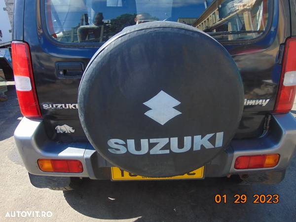 Husa roata Rezerva Suzuki Jimny dezmembrez jimny 1.3 ac 4x4 manuala cuplaj electric - 1