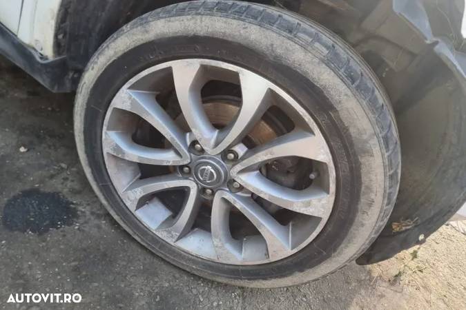 grila bord bara armatura spate vas lichid parbriz expansiune chedere geamuri laterale oglinda stanga dreapta haion portbagaj racitor gaze  Nissan Juke  2014 motor 1.5DCi 110cp k9k 636  dezmembrez dezmembrari - 8