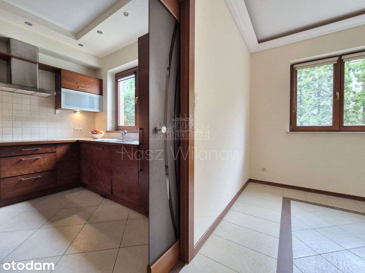 Dwupoziomowy apartament z pięknym ogrodem - Widok 4