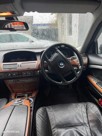 Dezmembrez BMW seria 7 E66 730Ld M57 231cp cutie calculator usa aripa capota portbagaj trager bara faruri xenon stop interior jante navigatie oglinzi plafon praguri volan etc - 15