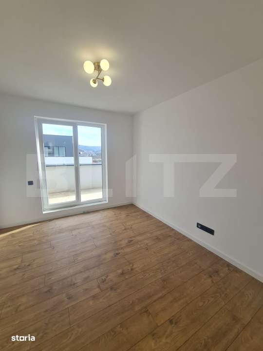 Apartament finisat, 52 mp utili, terasa 34 mp, zona Terra - Imagine principală: 5/8