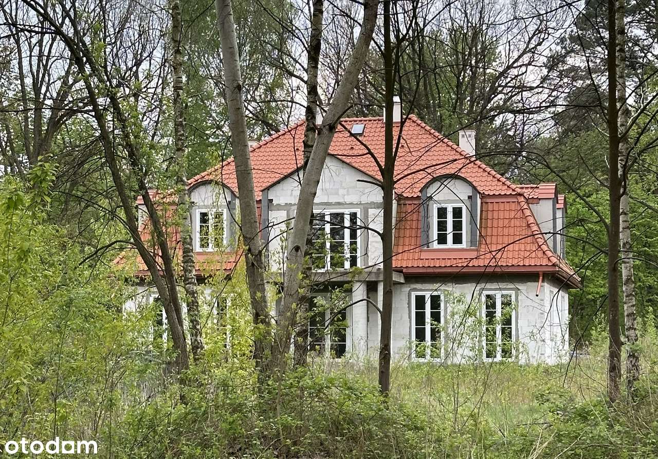 Bardzo ładny dom do własnej aranżacji.-0