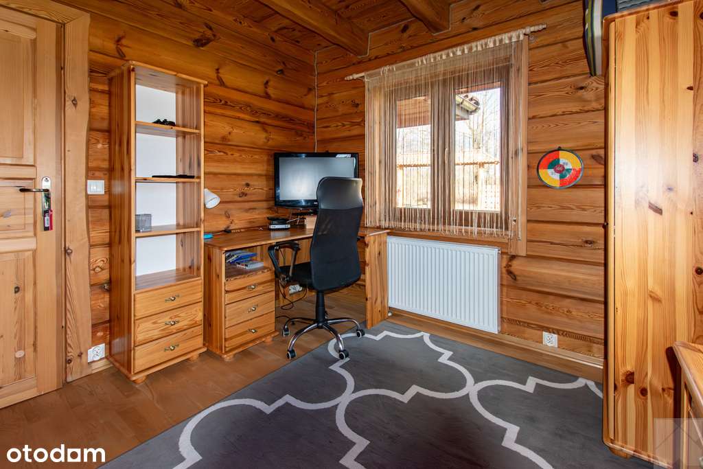 Dom z pełnego bala z zarybionym stawem-13