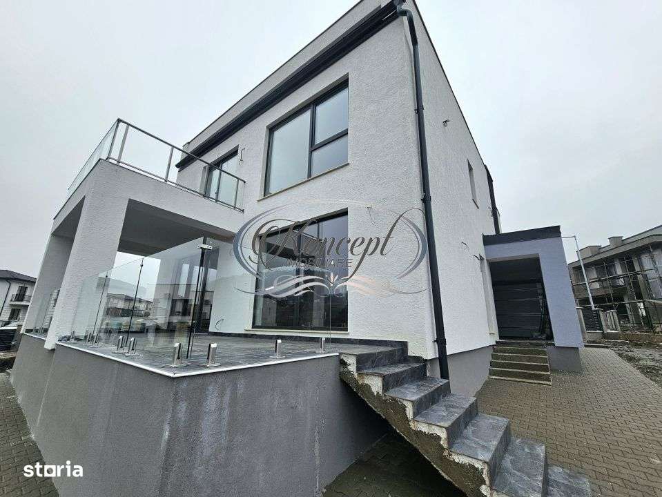 Proprietate moderna cu design exterior deosebit in Popesti - Imagine principală: 5/19